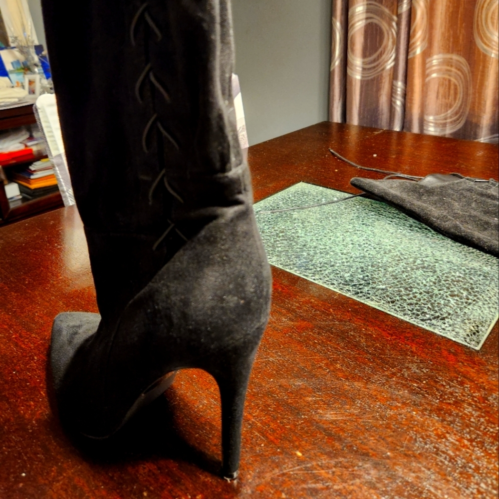 Over the knee black boots